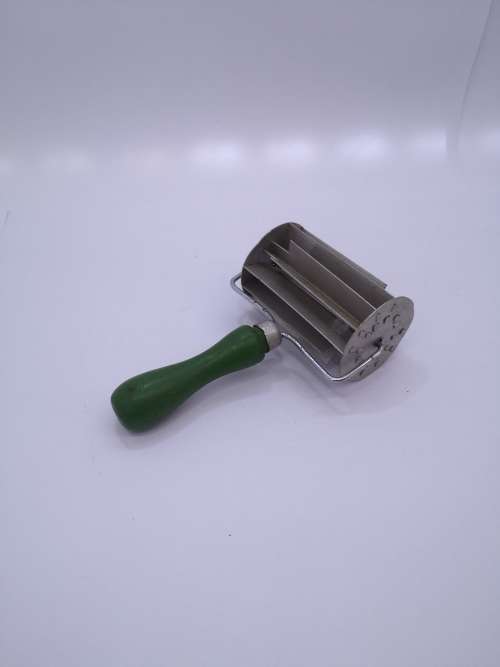 Vintage green wooden handle koeksister cutter