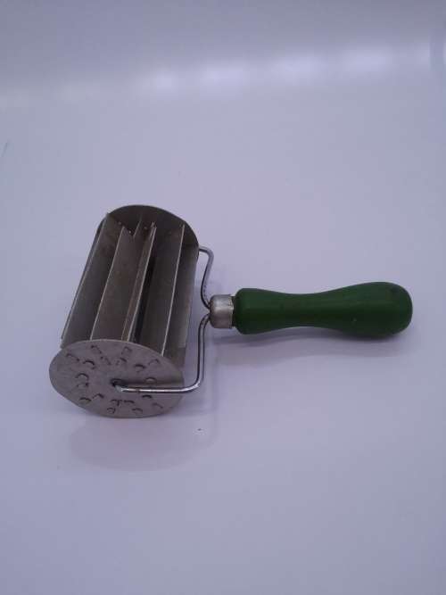 Vintage green wooden handle koeksister cutter