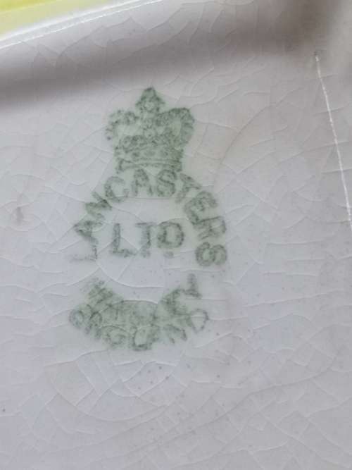 Lancasters England biscuit barrel - small -  note chip on the one foot