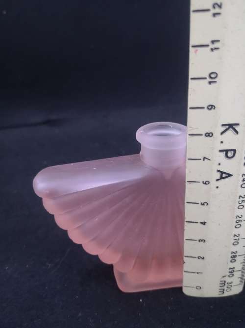 Vintage matt pink glass bottle