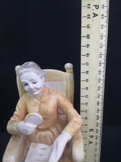 Old Lady/Grandma figurine on chair