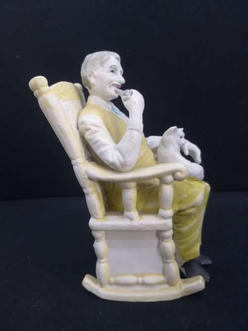 Old man/Grandpa figurine on chair