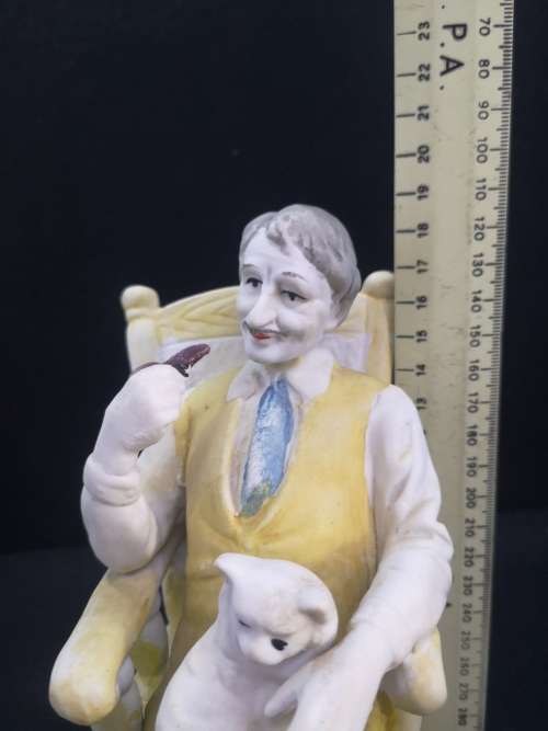 Old man/Grandpa figurine on chair