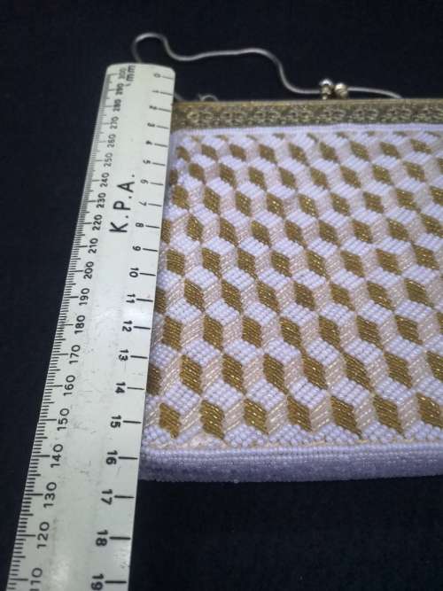 Fresh water pearls and vintage beaded handbag
