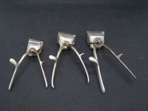 Oster and two more manual hair clippers