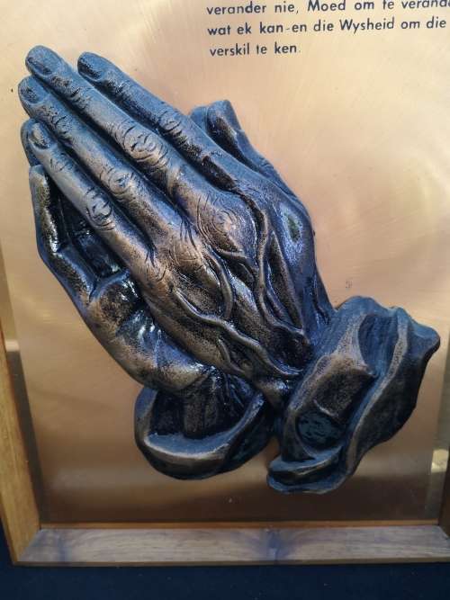 Vintage copper praying hands