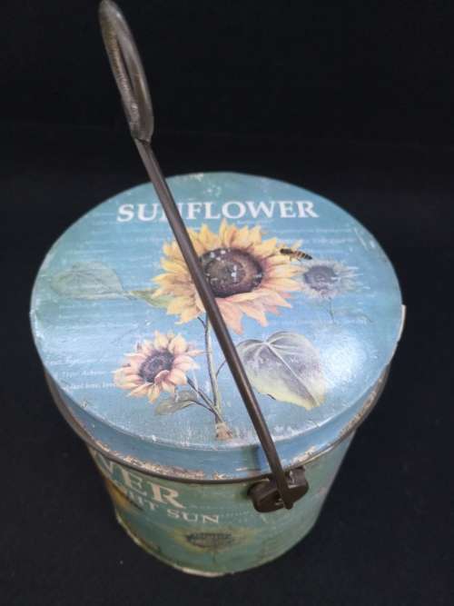 Sunflower seed tin with handle