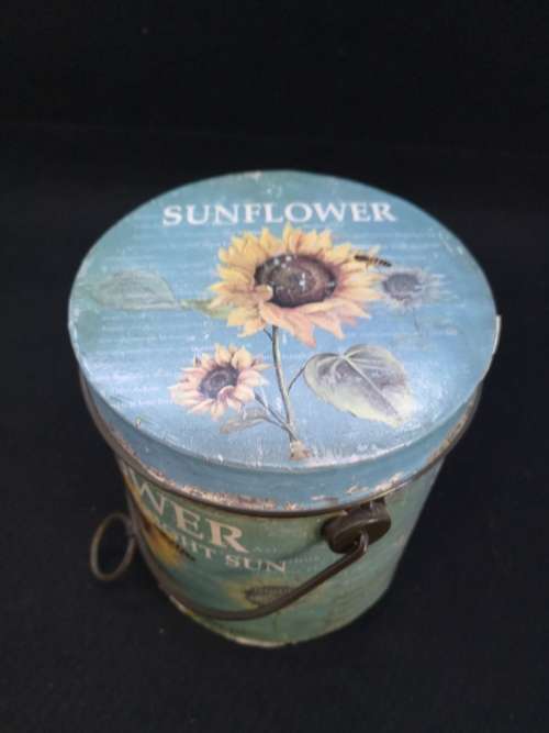 Sunflower seed tin with handle