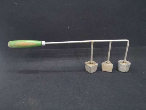 Vintage Snackle with wooden handle