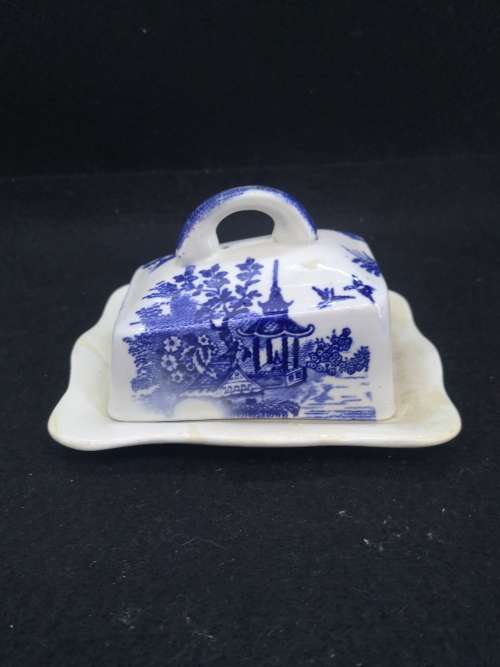 Repaired blue and white cheese dish and lid