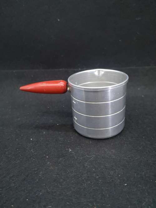 Aluminum measurement cup with wooden handle