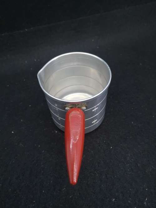 Aluminum measurement cup with wooden handle