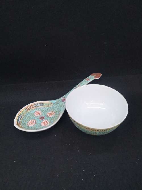 Oriental bowl and huge spoon