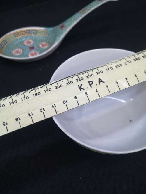 Oriental bowl and huge spoon