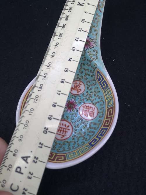 Oriental bowl and huge spoon