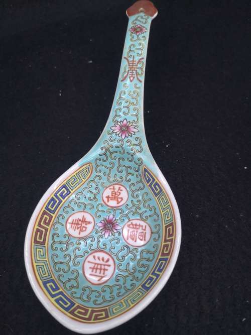 Oriental bowl and huge spoon