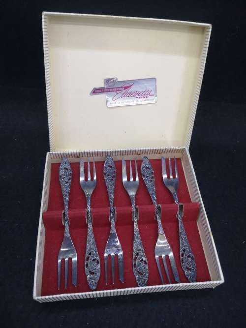 An awesome boxed set of Royal Dutch Silverworks `Elwezetta Line` cake forks