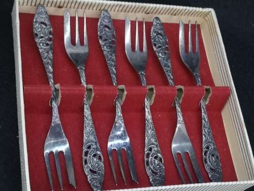 An awesome boxed set of Royal Dutch Silverworks `Elwezetta Line` cake forks