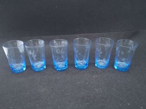 Turquoise liquor/shot glasses - one has two fleabites