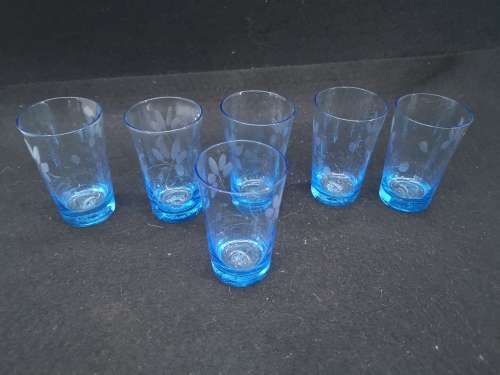 Turquoise liquor/shot glasses - one has two fleabites