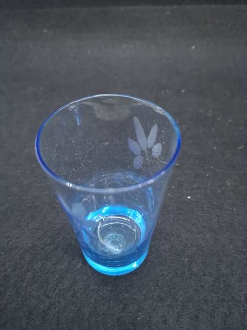 Turquoise liquor/shot glasses - one has two fleabites