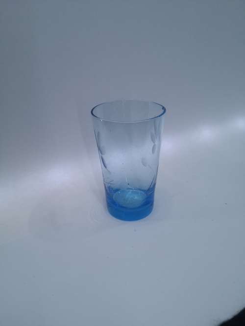 Turquoise liquor/shot glasses - one has two fleabites
