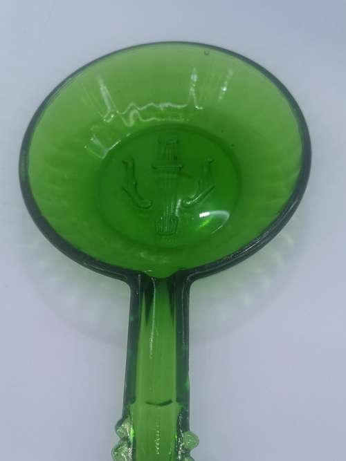 Vintage green glass bowl with handle