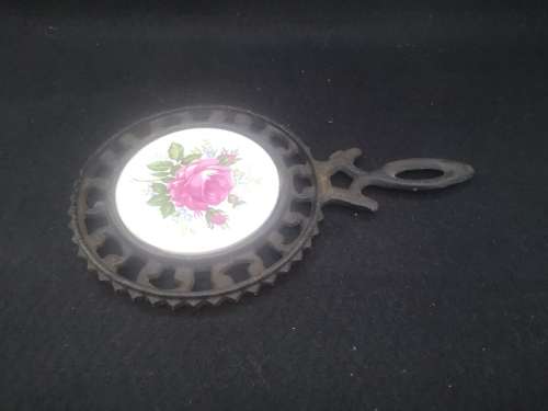 Cast iron and tile trivet