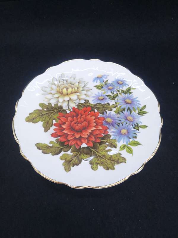 English fine china plate with gold rim and flowers