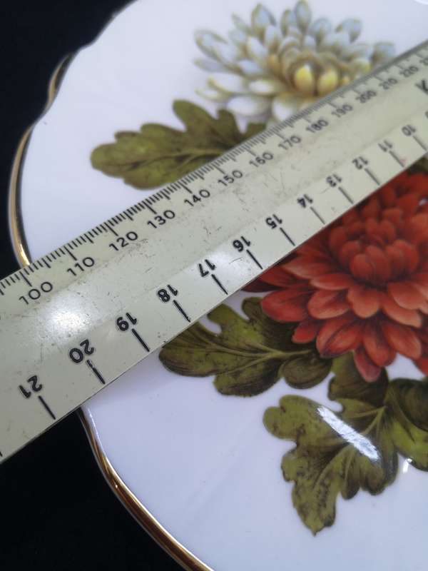English fine china plate with gold rim and flowers