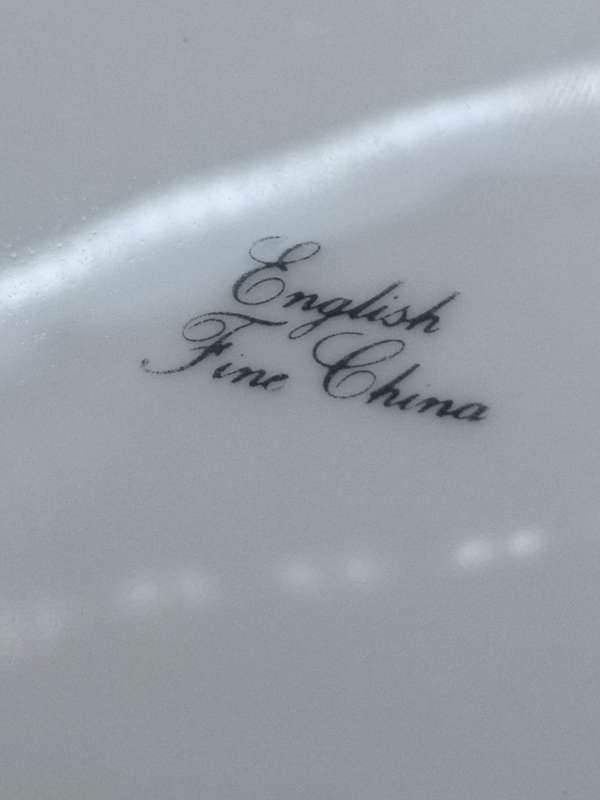 English fine china plate with gold rim and flowers