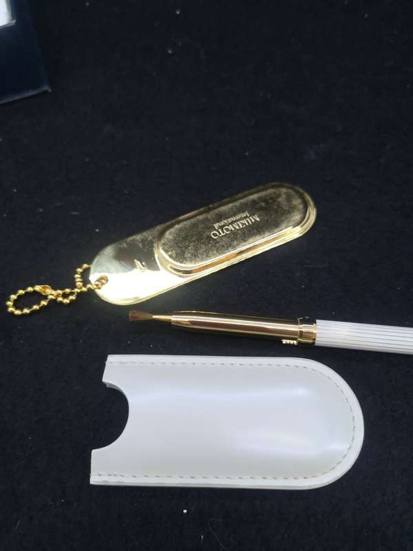 Mikimoto International lipstick brush and mirror