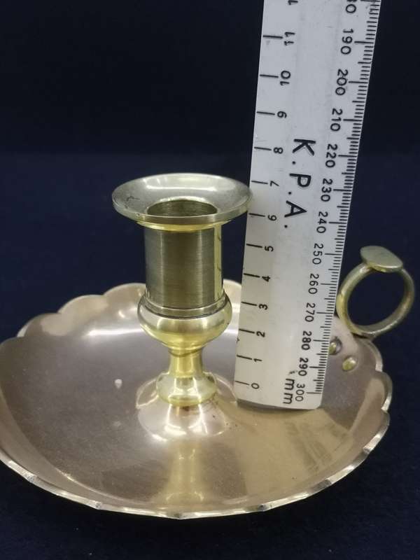 Solid antique brass candle holder/chamber stick