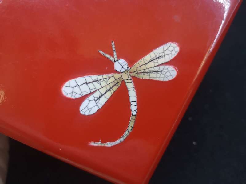 Vintage red lacquer jewelry box with dragonfly detail