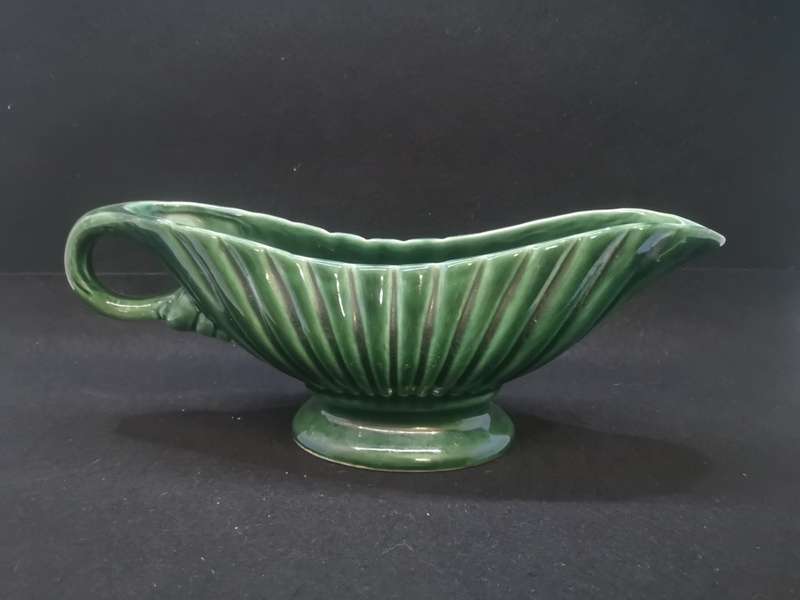 Vintage green vase - note the chip on the base - not noticeable when on display