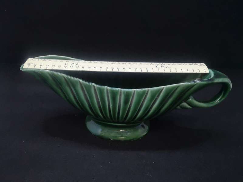 Vintage green vase - note the chip on the base - not noticeable when on display