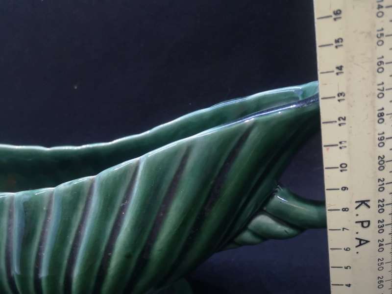 Vintage green vase - note the chip on the base - not noticeable when on display