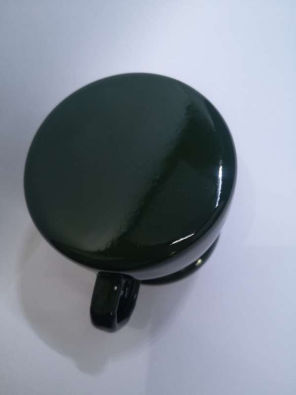 Dark green enamel jug