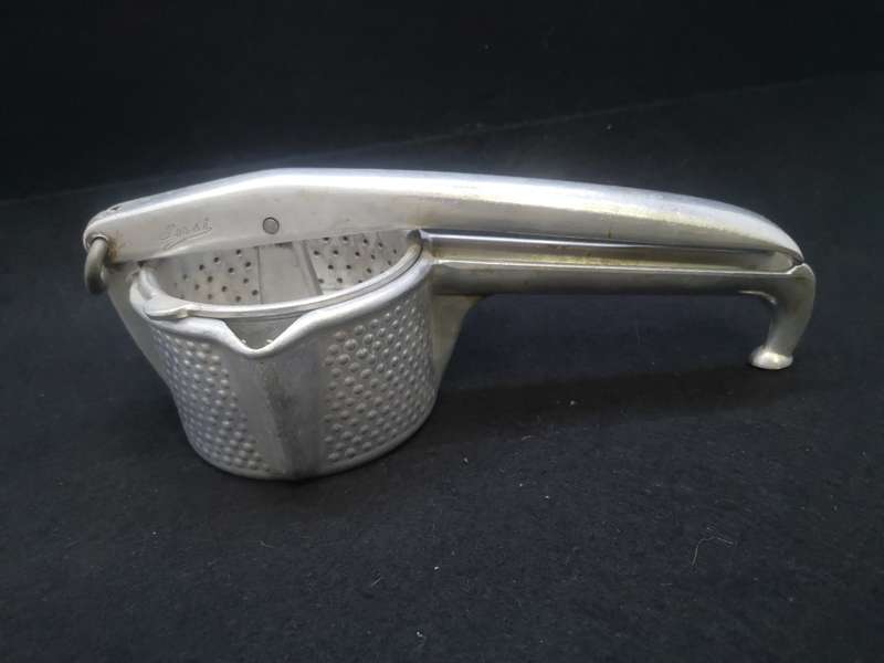 Vintage cast aluminum citrus press - Swiss made