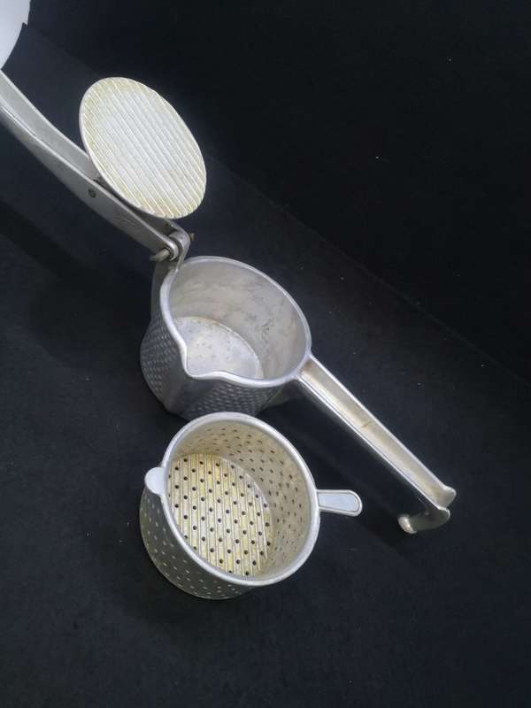 Vintage cast aluminum citrus press - Swiss made