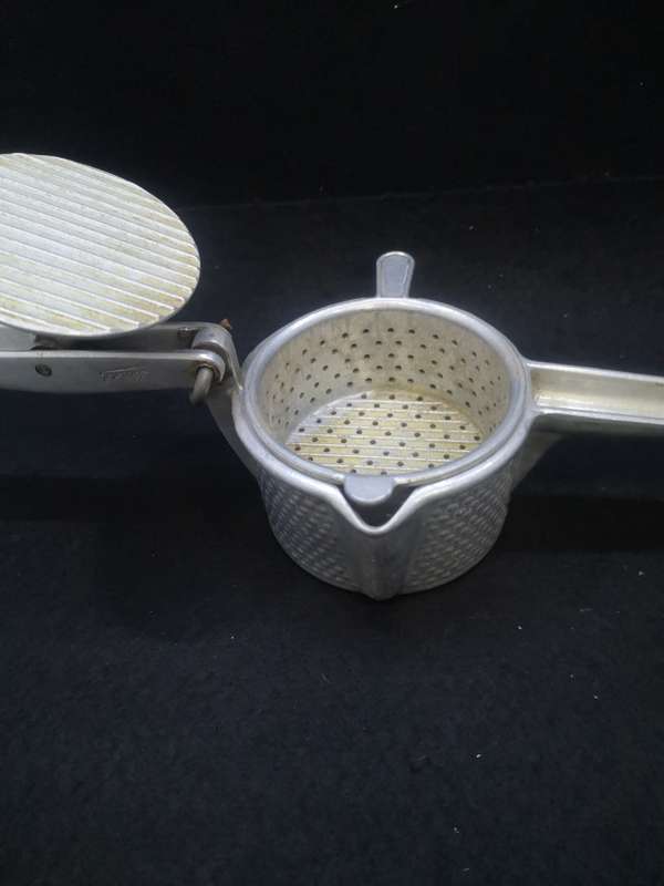 Vintage cast aluminum citrus press - Swiss made