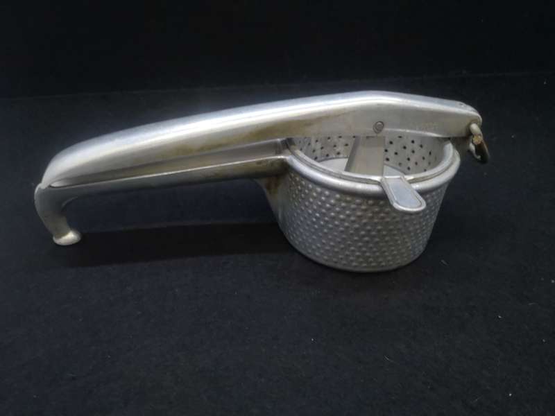 Vintage cast aluminum citrus press - Swiss made