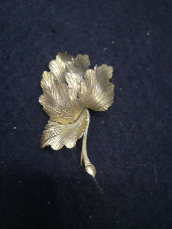 Gold color flower brooch