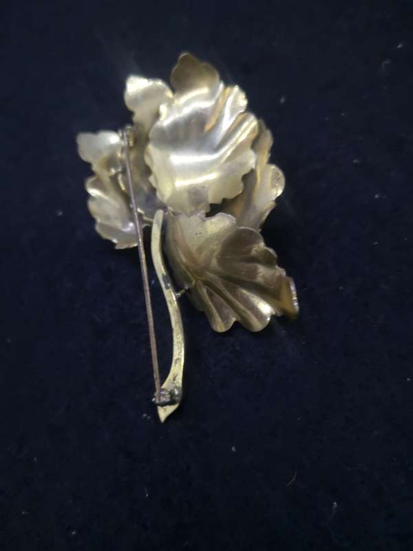 Gold color flower brooch