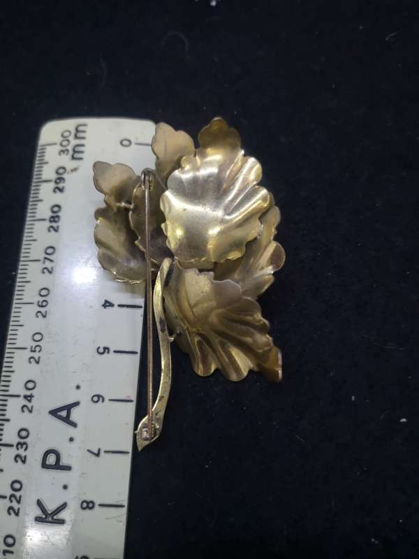 Gold color flower brooch