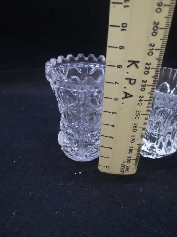 Set of three crystal glass vases