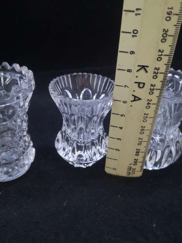 Set of three crystal glass vases