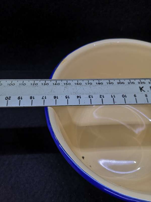 Vintage enamel bowl with lid