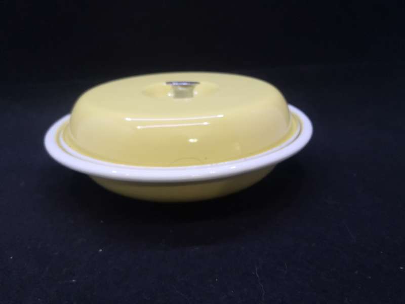 Old and heavy two division enamel bowl and lid - pastel yellow