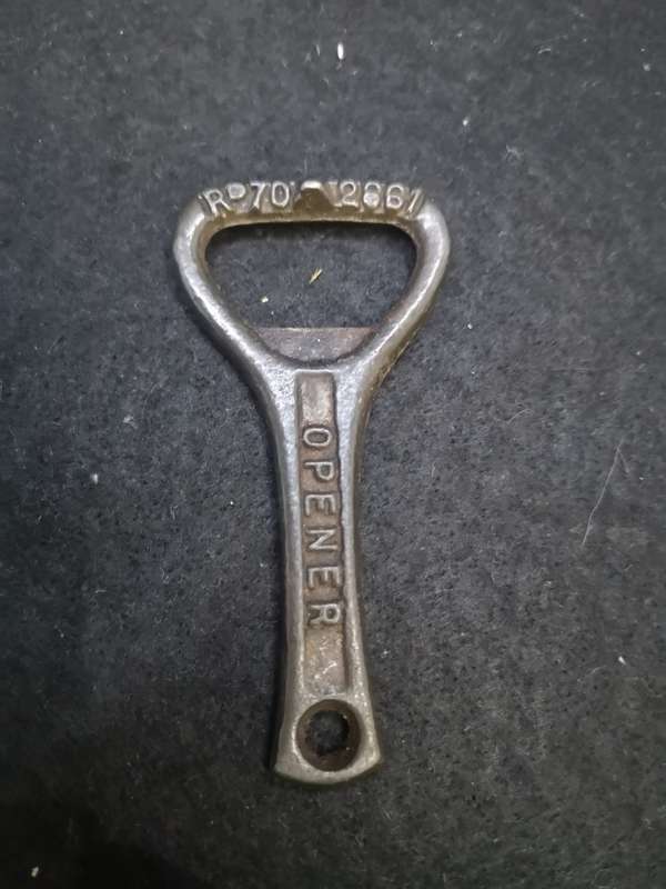 Crown cork bottle opener